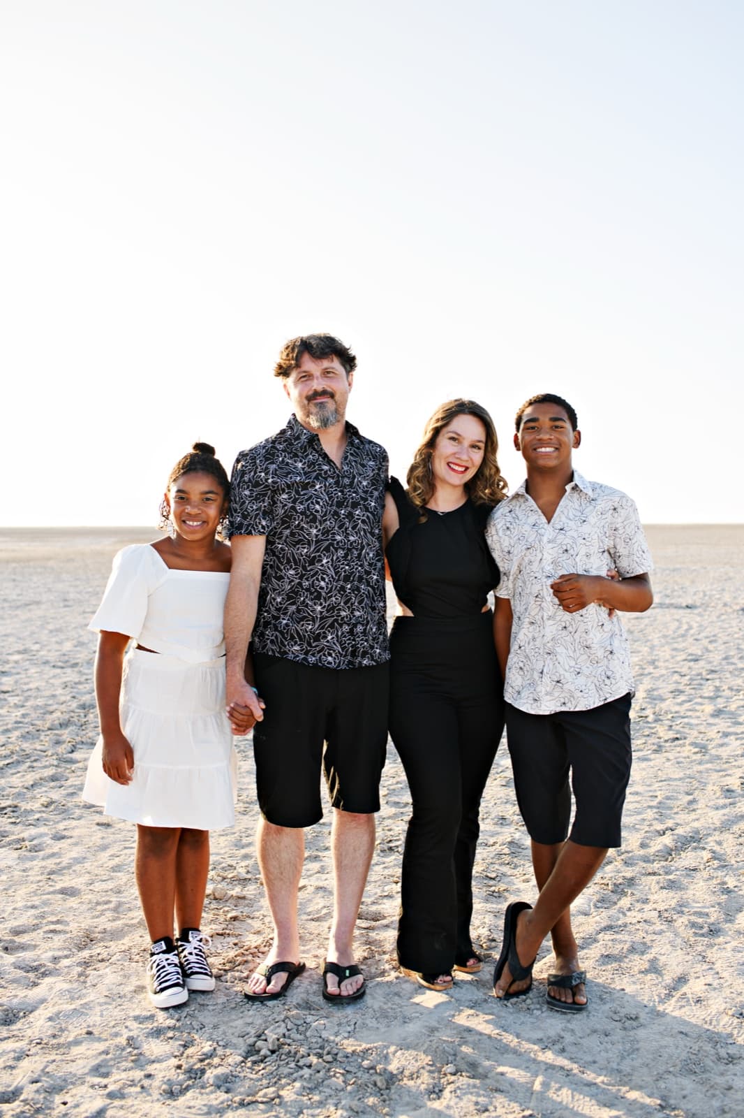 Rachel Patten with her family on the beach, embodied family connection